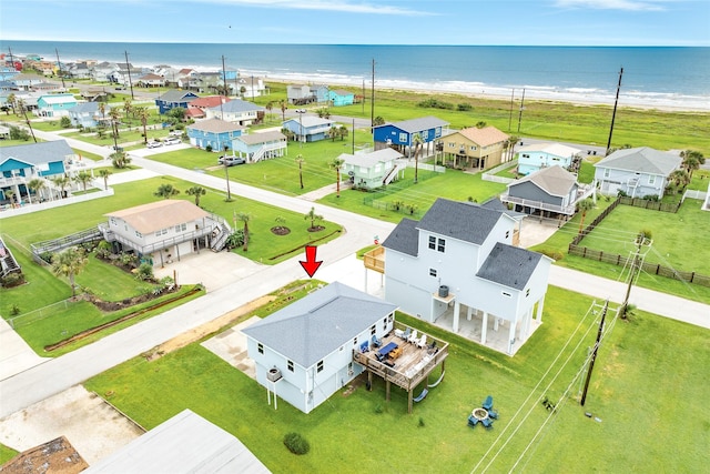 bird's eye view featuring a water view and a residential view