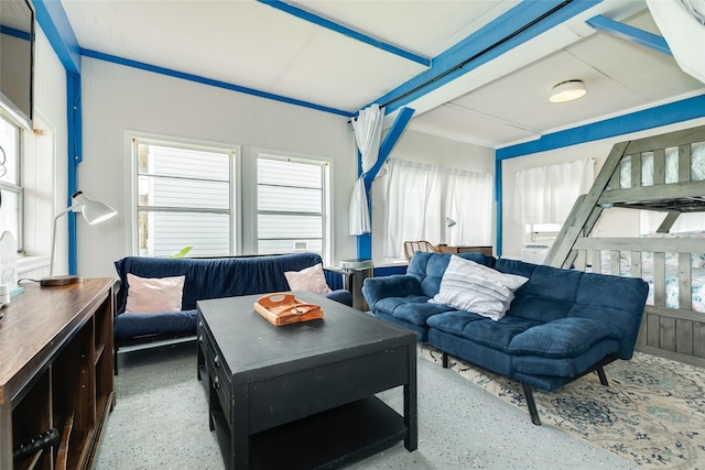 living area with speckled floor