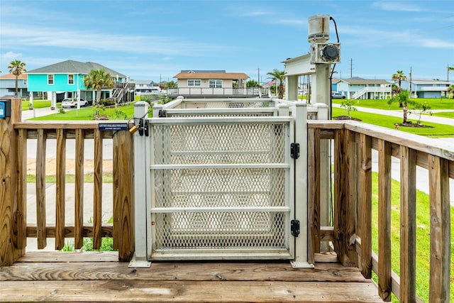 view of gate featuring a residential view