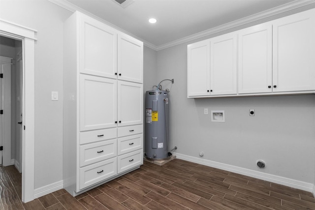 129 S Grace St, Crockett, TX 75835 - washroom featuring water heater, cabinet space, baseboards, hookup for an electric dryer, and hookup for a washing machine
