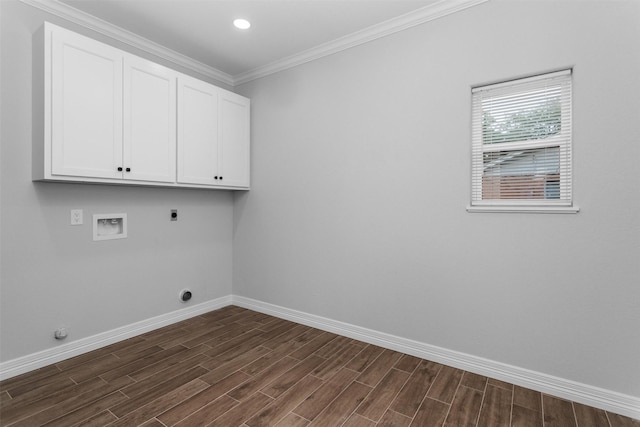 129 S Grace St, Crockett, TX 75835 - laundry area with baseboards, washer hookup, cabinet space, electric dryer hookup, and dark wood-style flooring