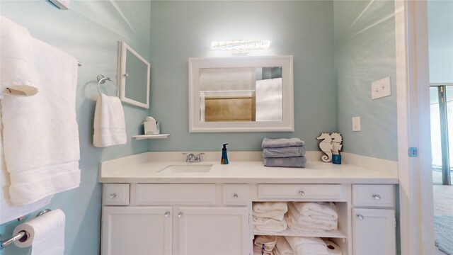 bathroom with vanity with extensive cabinet space