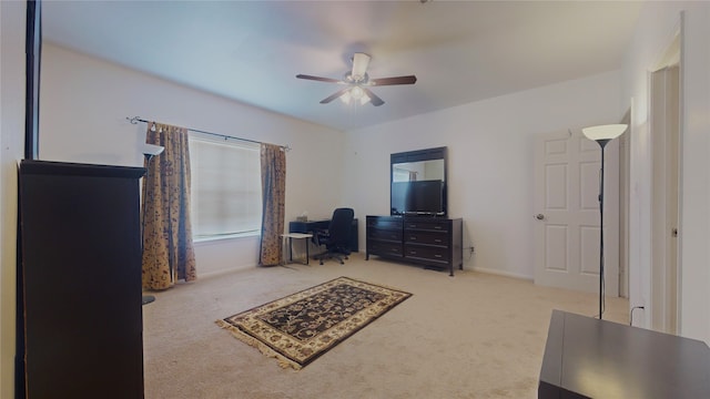 bedroom featuring ceiling fan and carpet floors