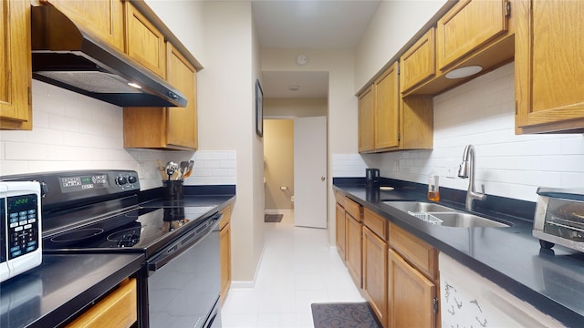 kitchen featuring sink, backsplash, black range with electric cooktop, and light tile floors