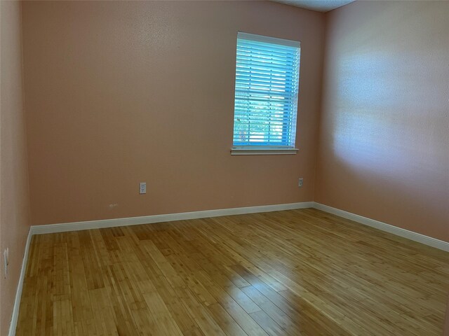 empty room featuring light hardwood / wood-style floors