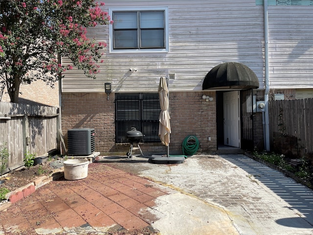 view of patio with central air condition unit