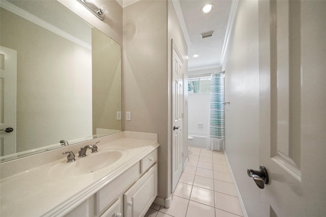 bathroom with tile patterned floors, vanity, ornamental molding, and shower / tub combo