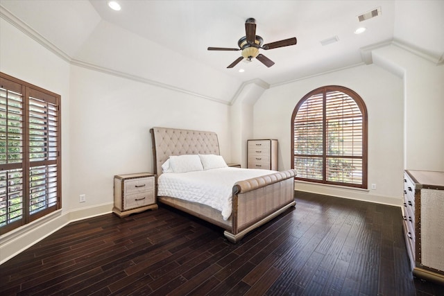 bedroom with ceiling fan, dark hardwood / wood-style flooring, crown molding, and vaulted ceiling