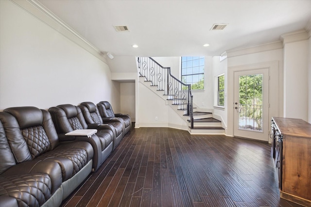 living room featuring dark hardwood / wood-style floors and ornamental molding