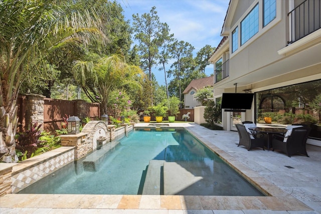 view of pool with a patio