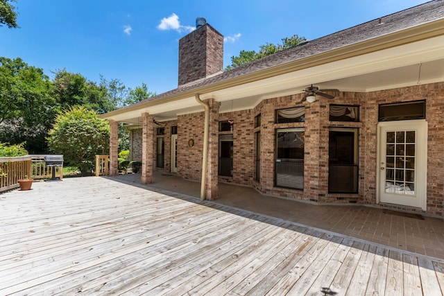 wooden deck with ceiling fan