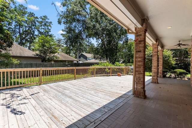 wooden terrace with ceiling fan