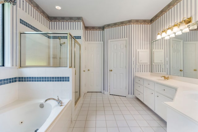 bathroom featuring vanity, tile patterned floors, and plus walk in shower