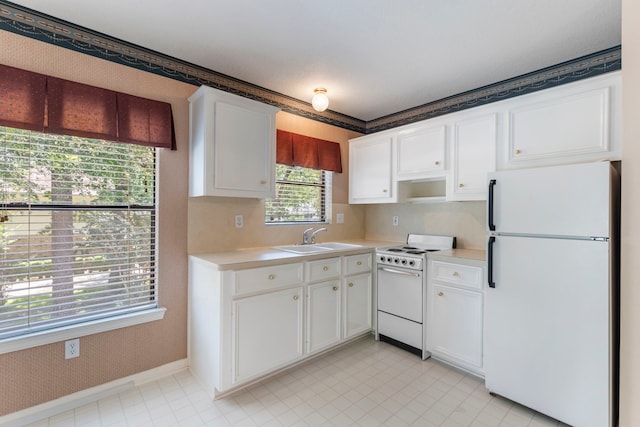 kitchen with white cabinetry, ornamental molding, sink, and white appliances