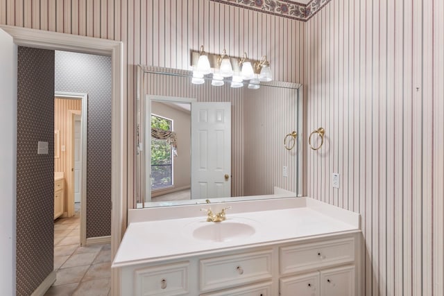 bathroom with vanity and tile patterned flooring