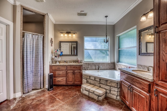 bathroom featuring vanity, crown molding, and a textured ceiling