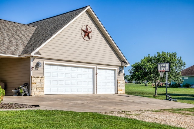 garage with a yard