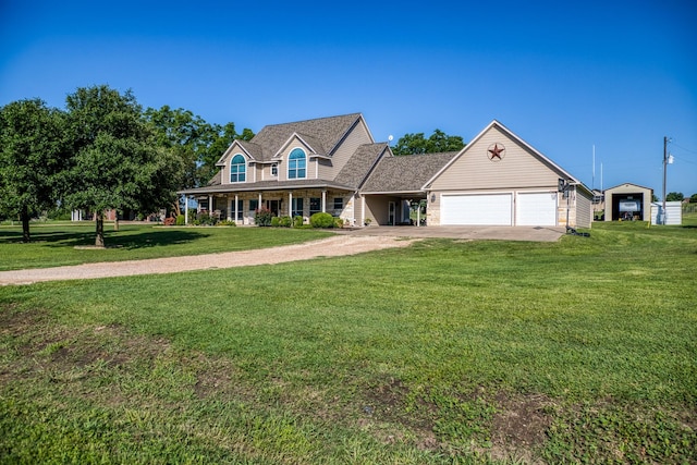 cape cod-style house featuring covered porch, a front yard, and a garage