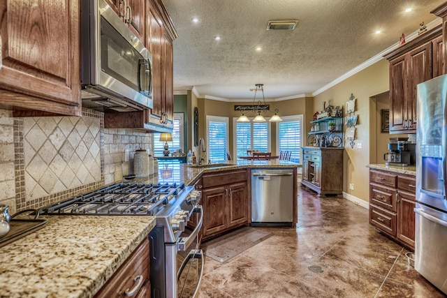 kitchen featuring decorative backsplash, light stone counters, appliances with stainless steel finishes, and crown molding