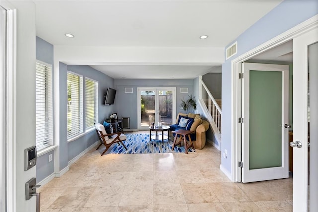 living area featuring french doors