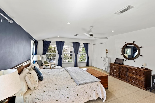 bedroom featuring ceiling fan and lofted ceiling