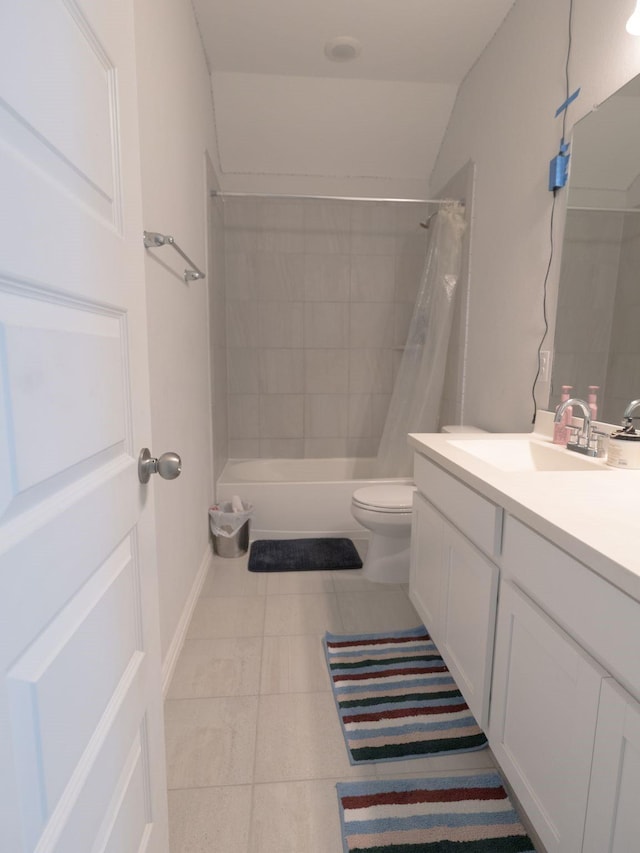 full bathroom featuring shower / bathtub combination with curtain, tile patterned floors, vanity, and toilet