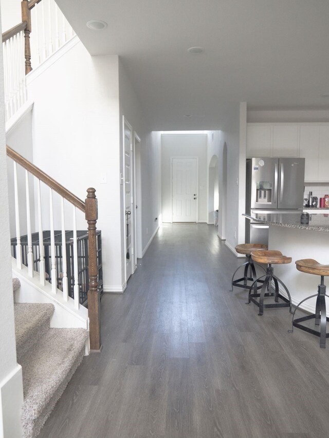 interior space with dark hardwood / wood-style floors