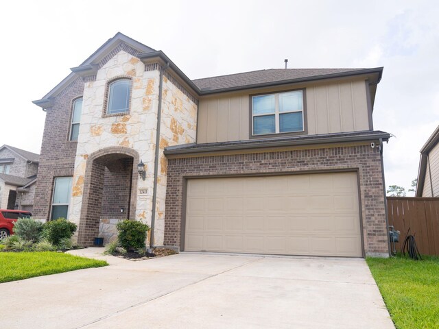 view of front of property featuring a garage