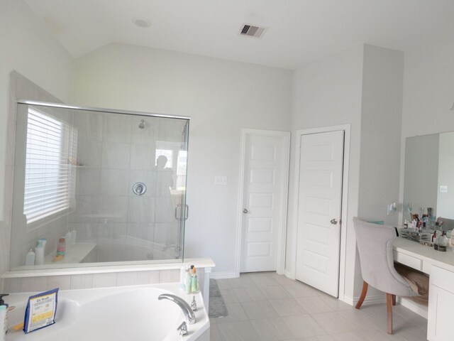 bathroom with vanity, tile patterned flooring, and independent shower and bath