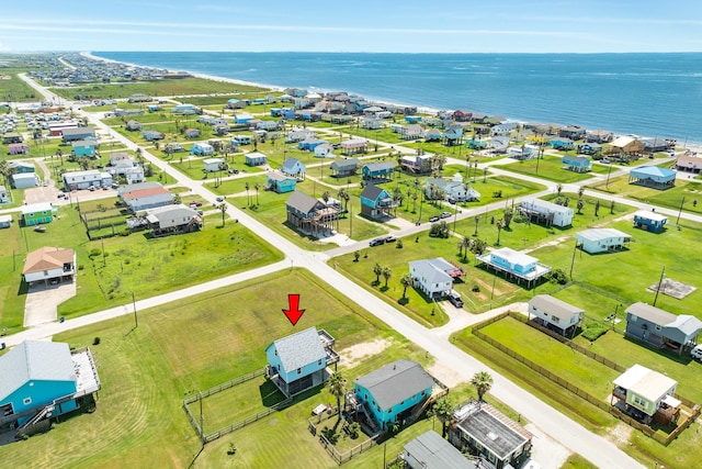 birds eye view of property featuring a residential view and a water view