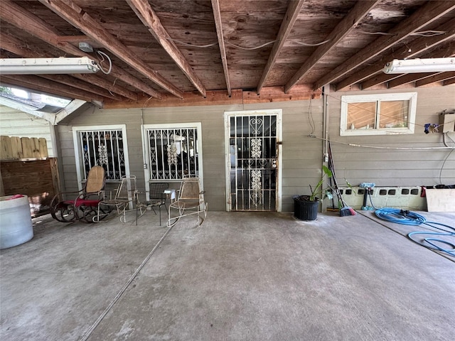 view of patio featuring fence