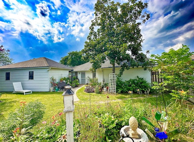 exterior space with a yard