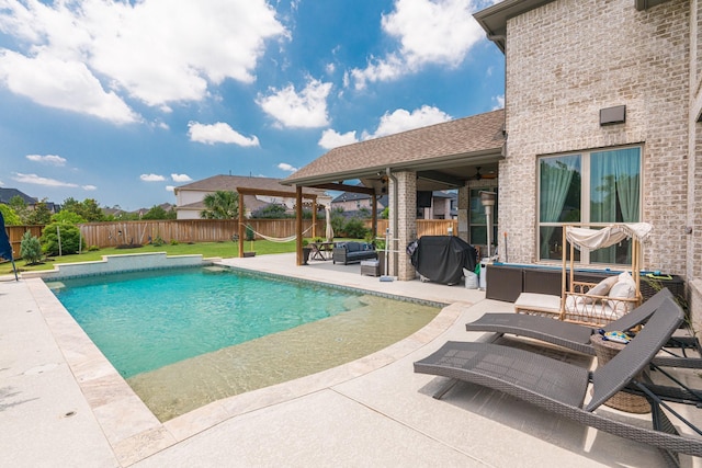 view of pool featuring a patio area, ceiling fan, grilling area, and an outdoor hangout area