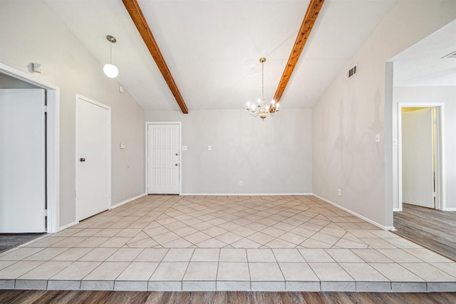 interior space with lofted ceiling with beams and a notable chandelier