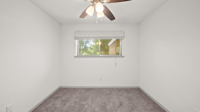 unfurnished room with ceiling fan and light colored carpet