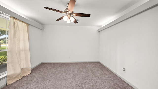 unfurnished room featuring carpet and ceiling fan