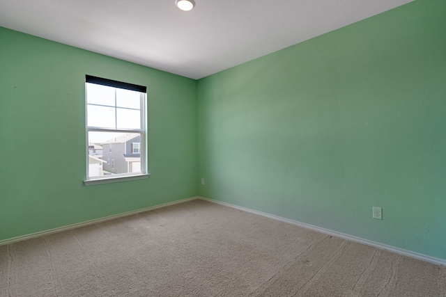 view of carpeted spare room