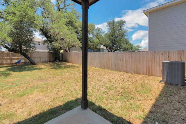 view of yard featuring central AC unit