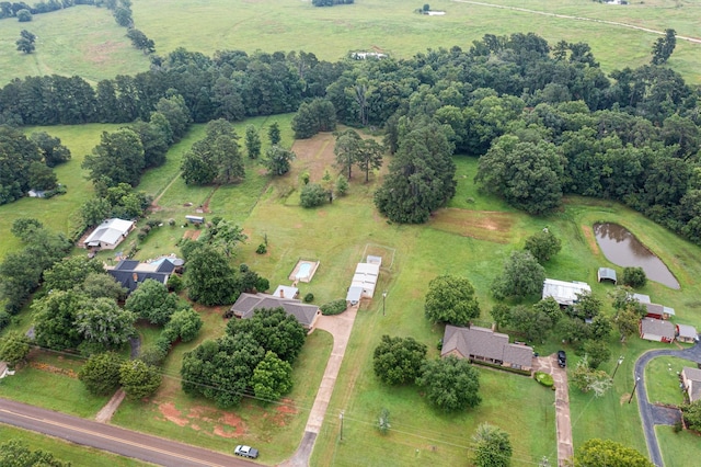 aerial view featuring a rural view and a water view