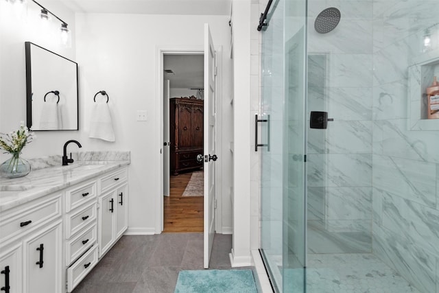 bathroom with vanity, tile patterned floors, and an enclosed shower