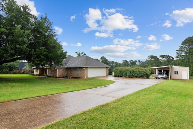 view of front of house with a front yard and a carport