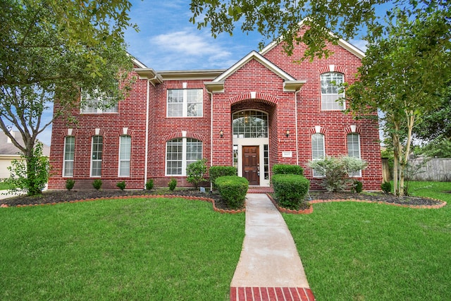 view of front of home with a front yard