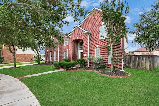 front facade featuring a front lawn