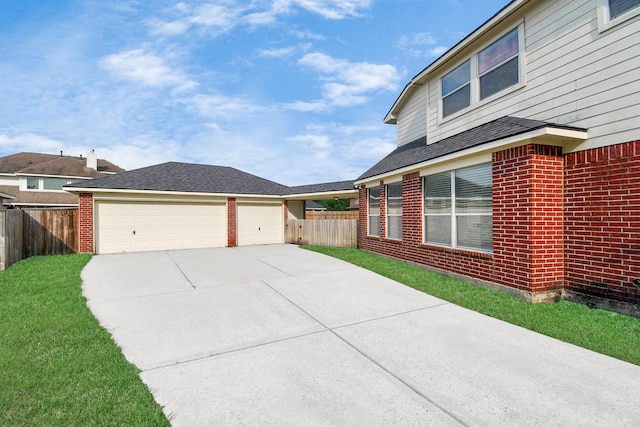 view of side of property with a garage