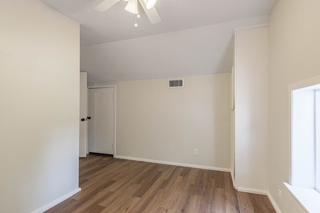 additional living space featuring hardwood / wood-style floors and ceiling fan