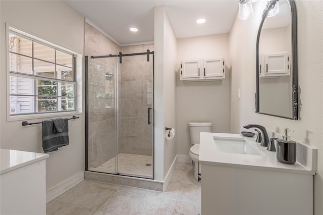 bathroom featuring walk in shower, vanity with extensive cabinet space, toilet, and tile floors