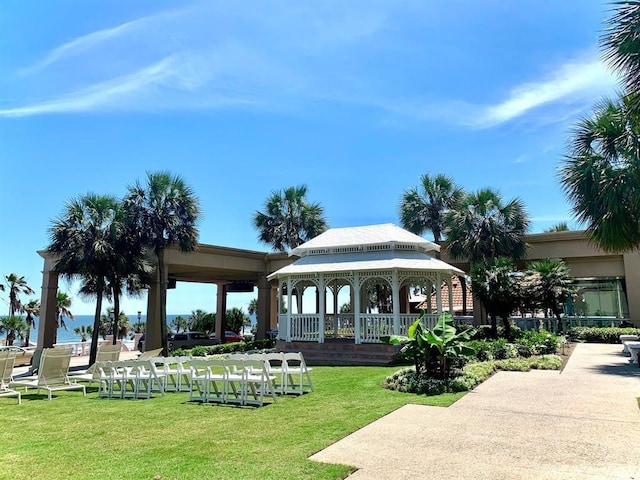 surrounding community featuring a gazebo and a yard