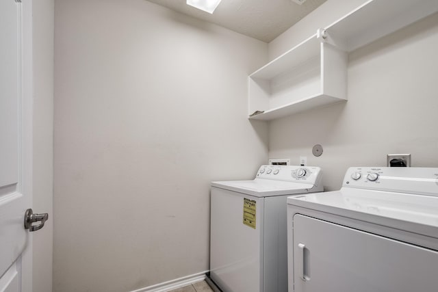 laundry room with washing machine and dryer