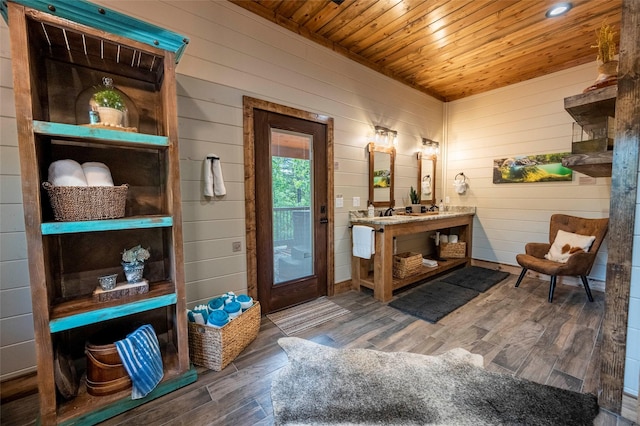 entryway featuring wooden ceiling and wood finished floors