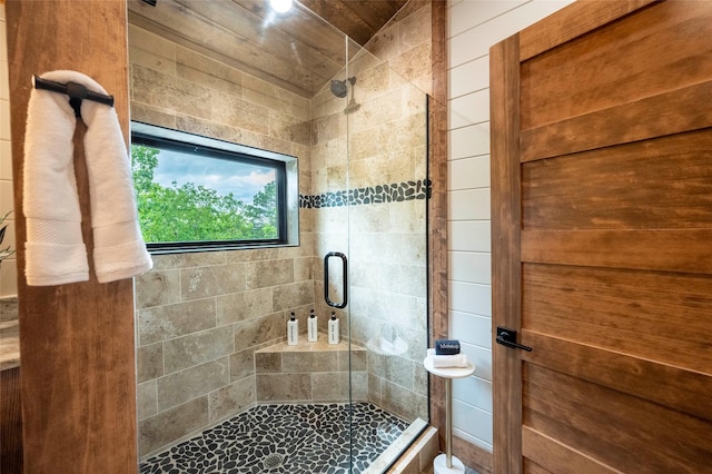 full bathroom featuring a shower stall